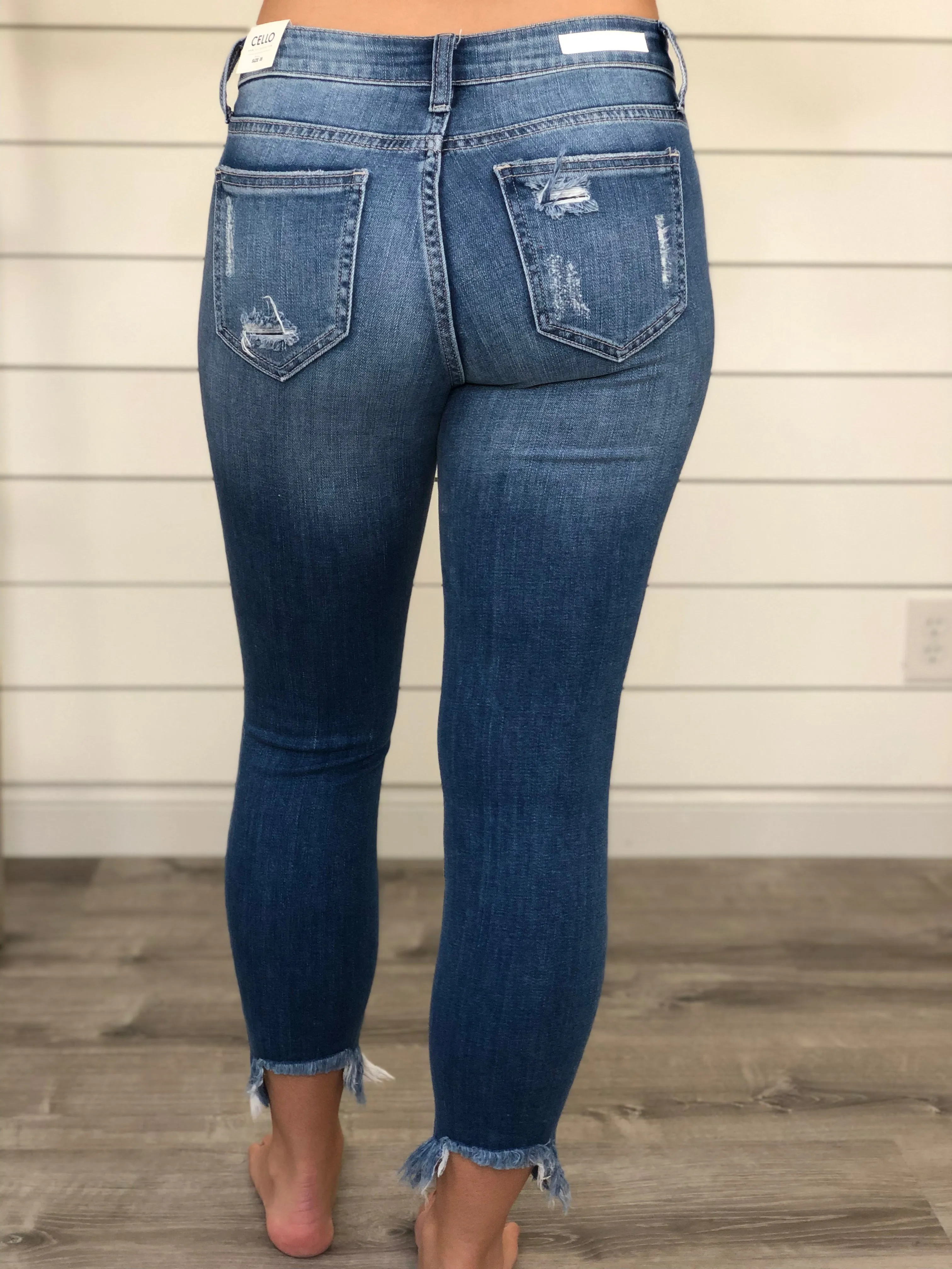 Distressed Out Jeans in Light Wash